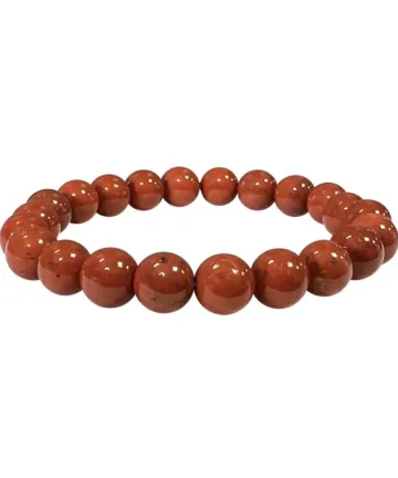 Le Bracelet Jaspe Rouge, reconnu pour son énergie dynamisante, est un formidable activateur de vitalité. Ce type de jaspe, parmi les plus énergiques, agit directement sur les chakras inférieurs ainsi que sur les jambes et les genoux, libérant ainsi les blocages et favorisant une circulation fluide de l'énergie.